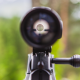 A rifle scope with a proper sight picture looking into the distance.